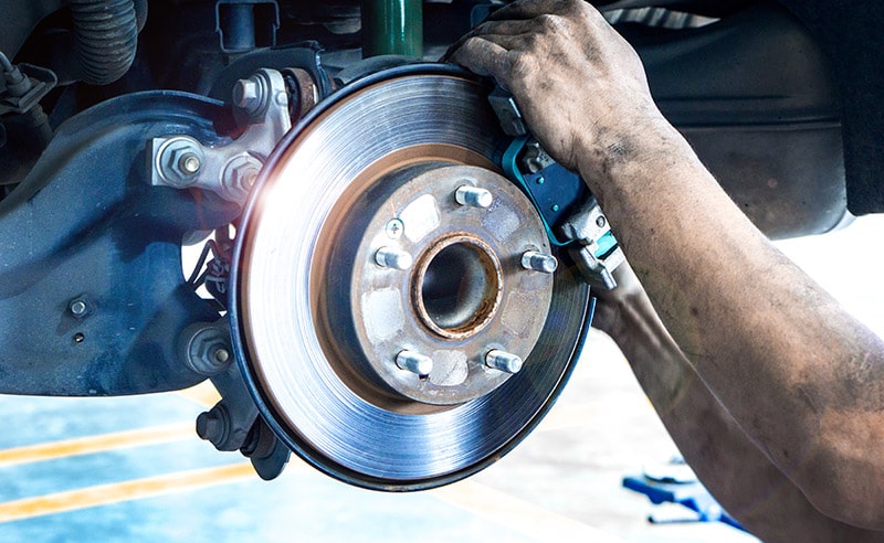 Mechanic-Repairing-Disc-Brakes